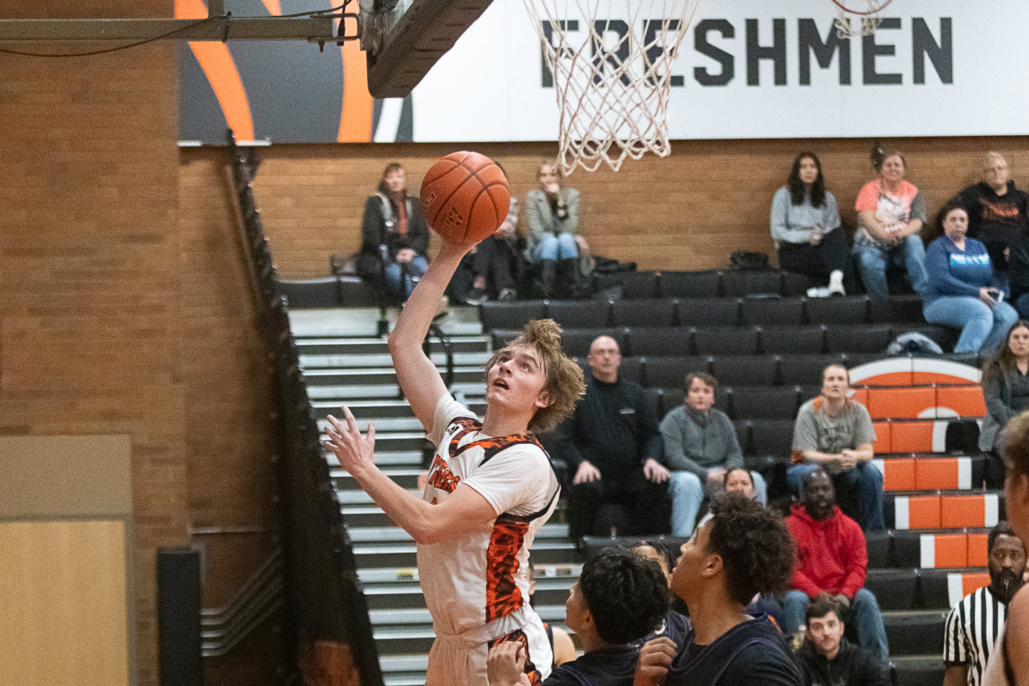 Cohen Ballard puts up an acrobatic shot during the first half of Centralia's 56-34 loss to Heritage on Dec. 2.
