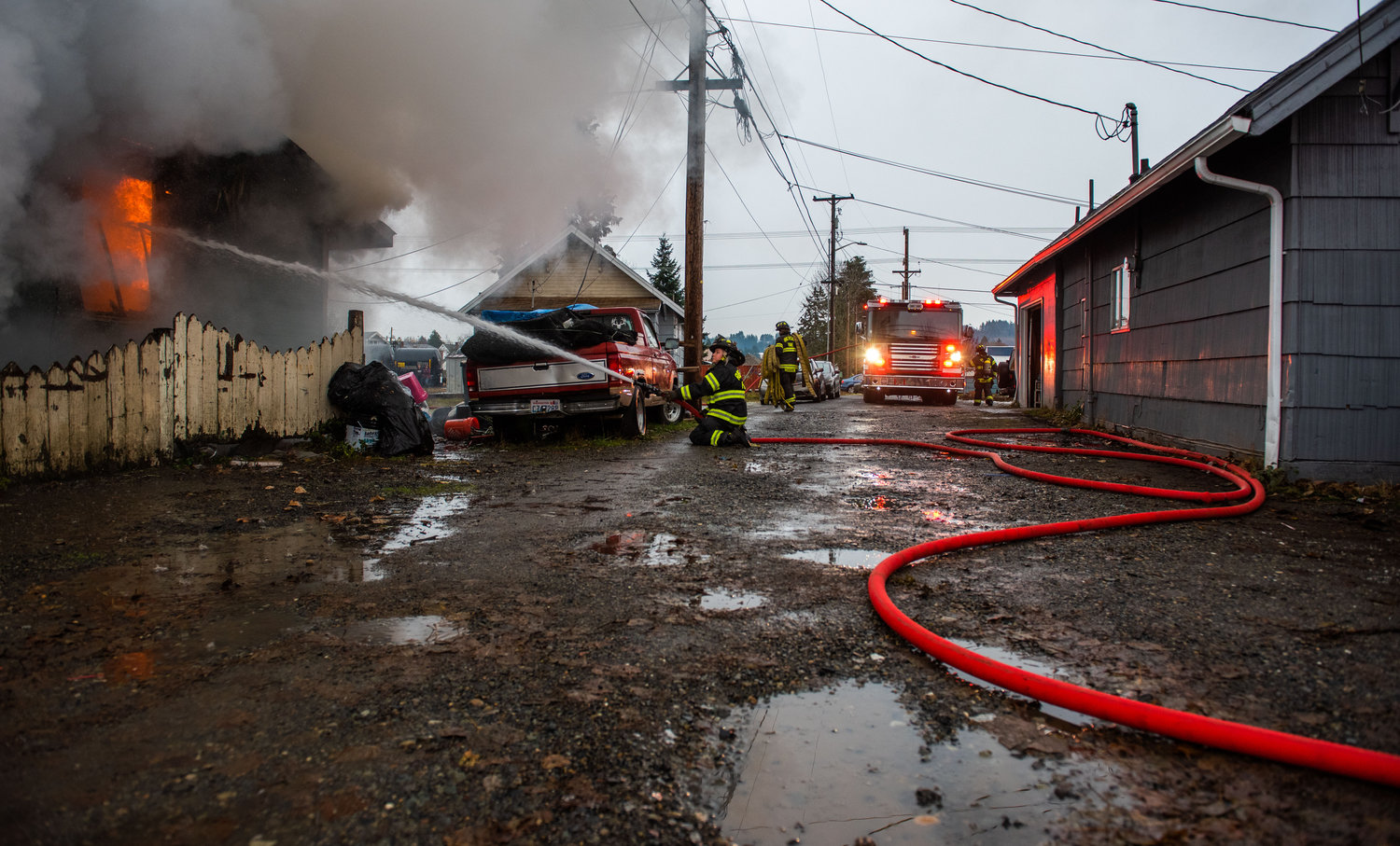 Riverside Fire Authority responds to a residential structure fire off W. Main Street in Centralia on Sunday.
