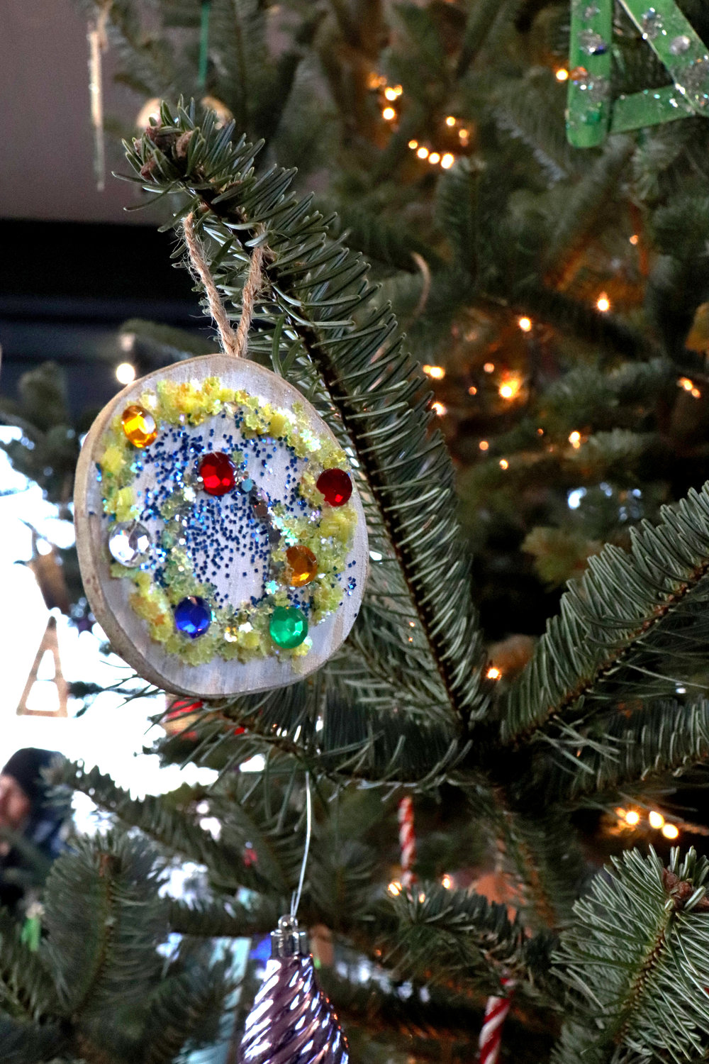 Handmade ornaments donated by the Summit Center for Child Development hang from the City of Chehalis’ Christmas tree outside the Lewis County Historical Museum.