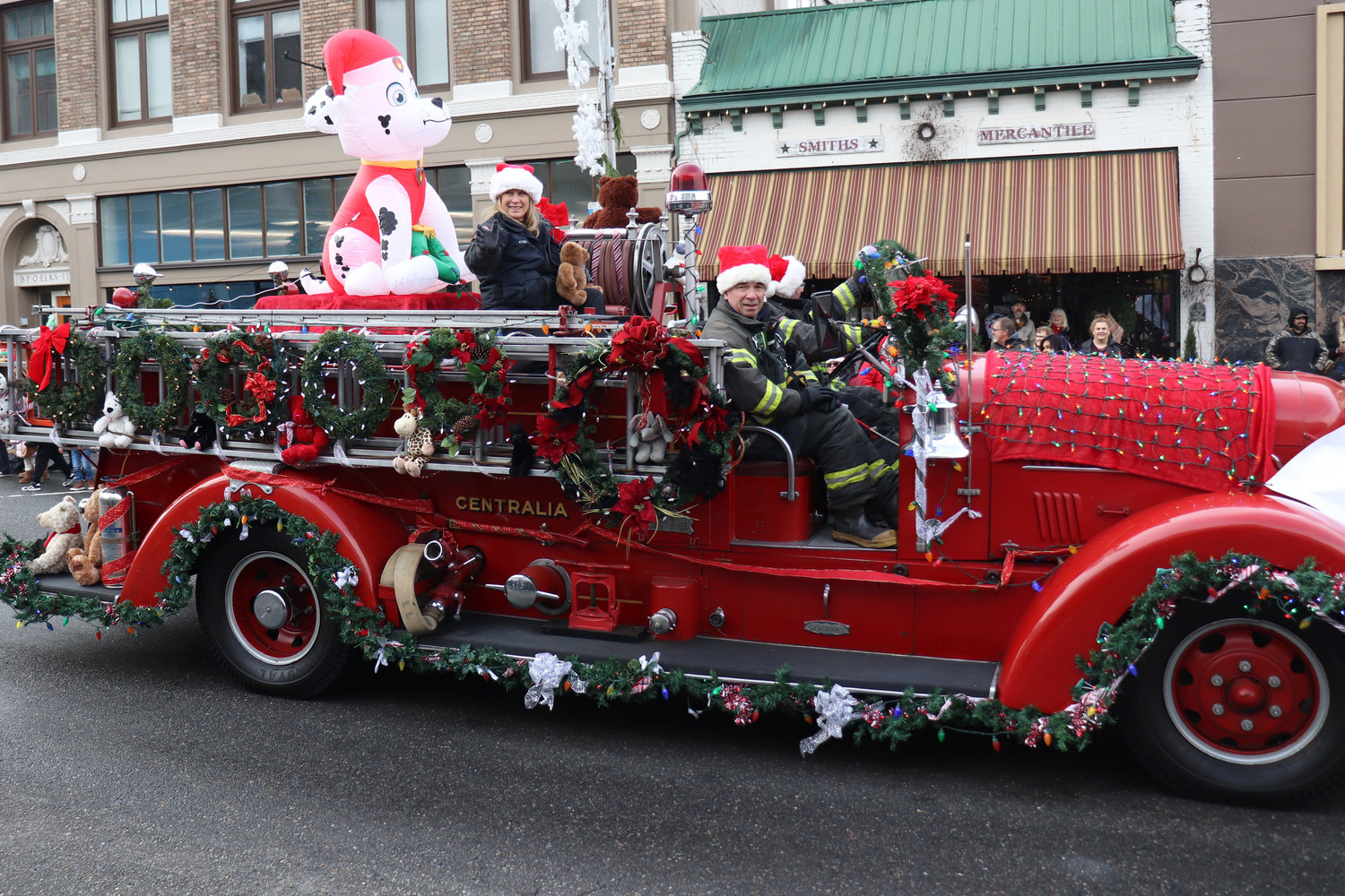 Riverside Fire Authority Chief Michael Kytta serves as the grand marshal of the Santa Parade in downtown Chehalis on Saturday.