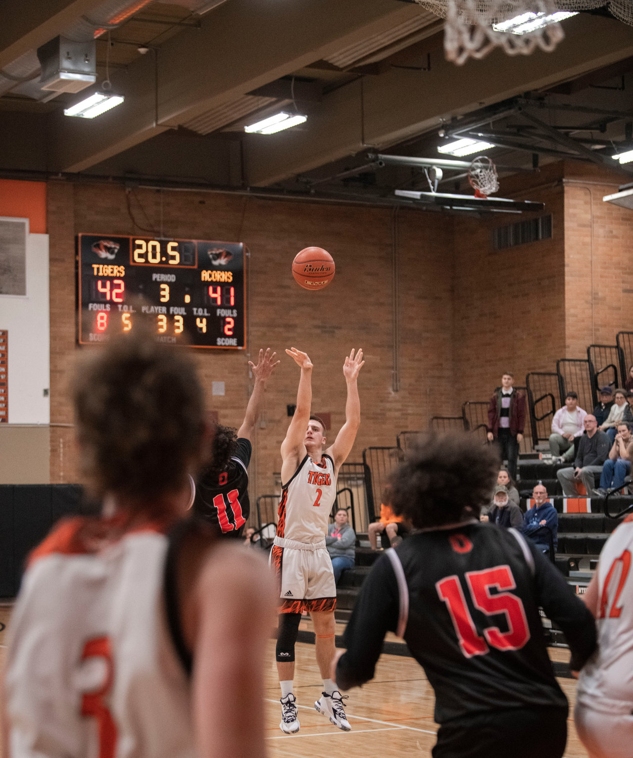 Centralia’s Brady Sprague (2) attempts a 3-point shot Monday night during a game against Oakville.