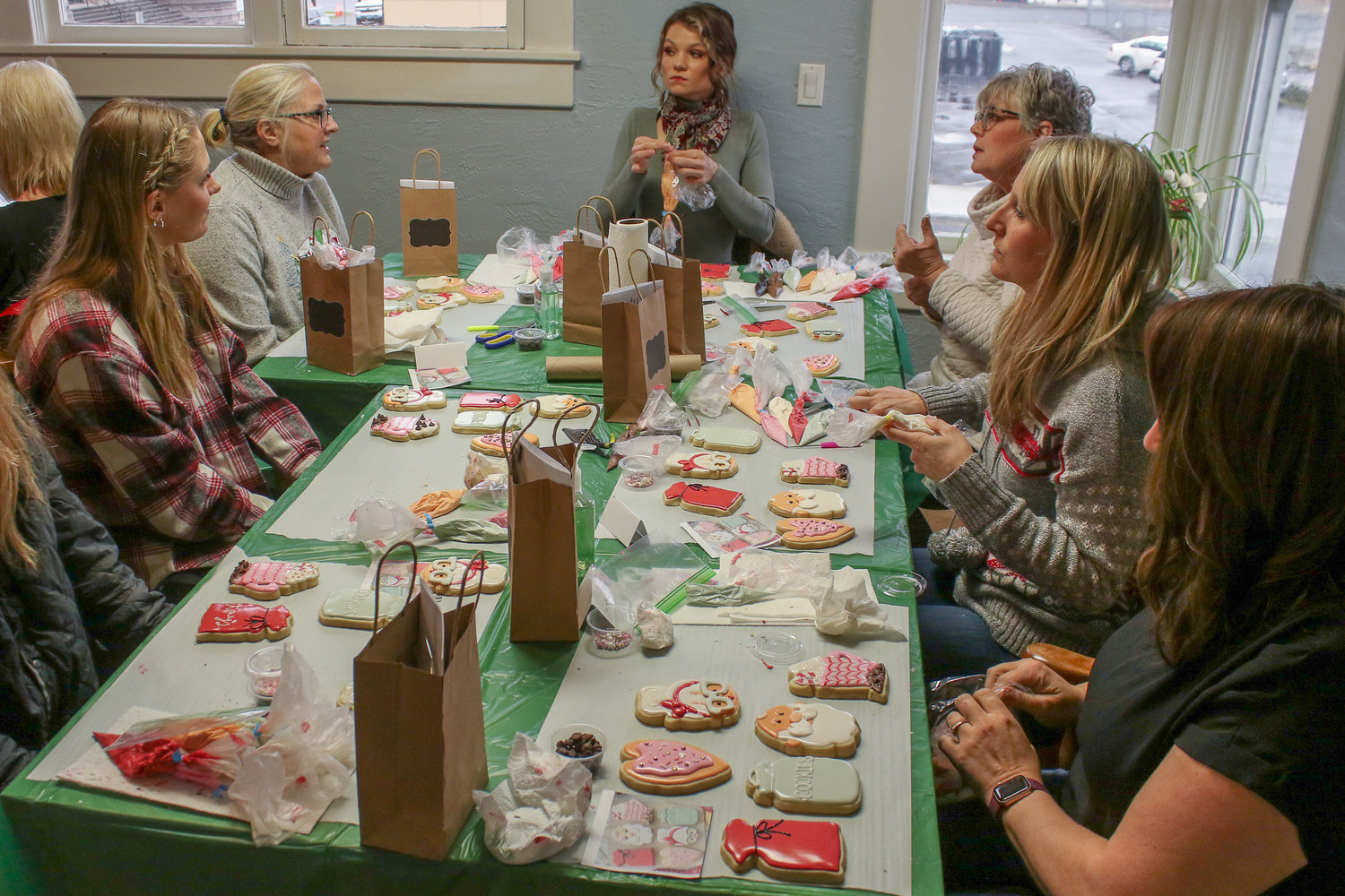 Lewis County locals finish up decorating sugar cookies during a royal icing decorating class taught by Anna Martin from Rochester. Martin owns her own baking company, Anna's Bakery.