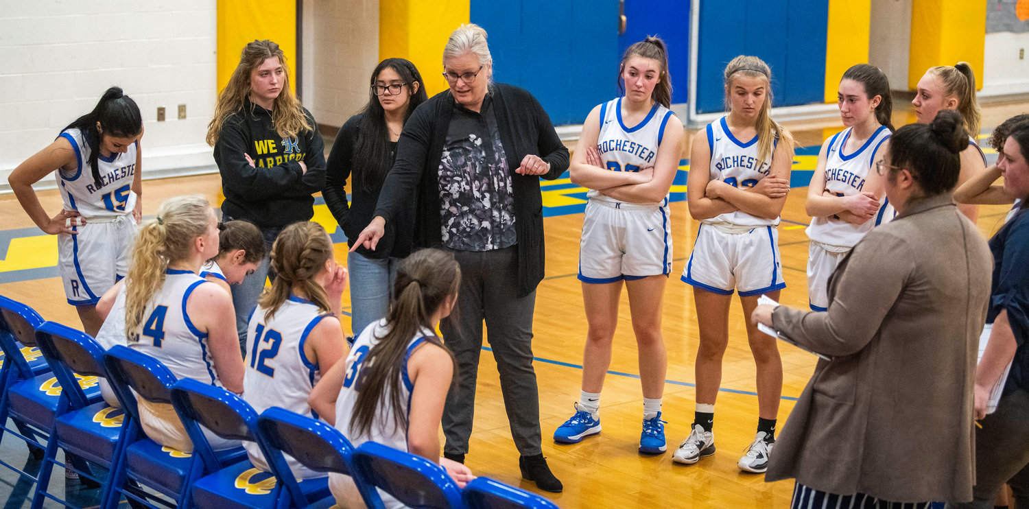 Rochester Head Coach Davina Serdahl talks to players during a timeout Tuesday night in a game against Shelton.