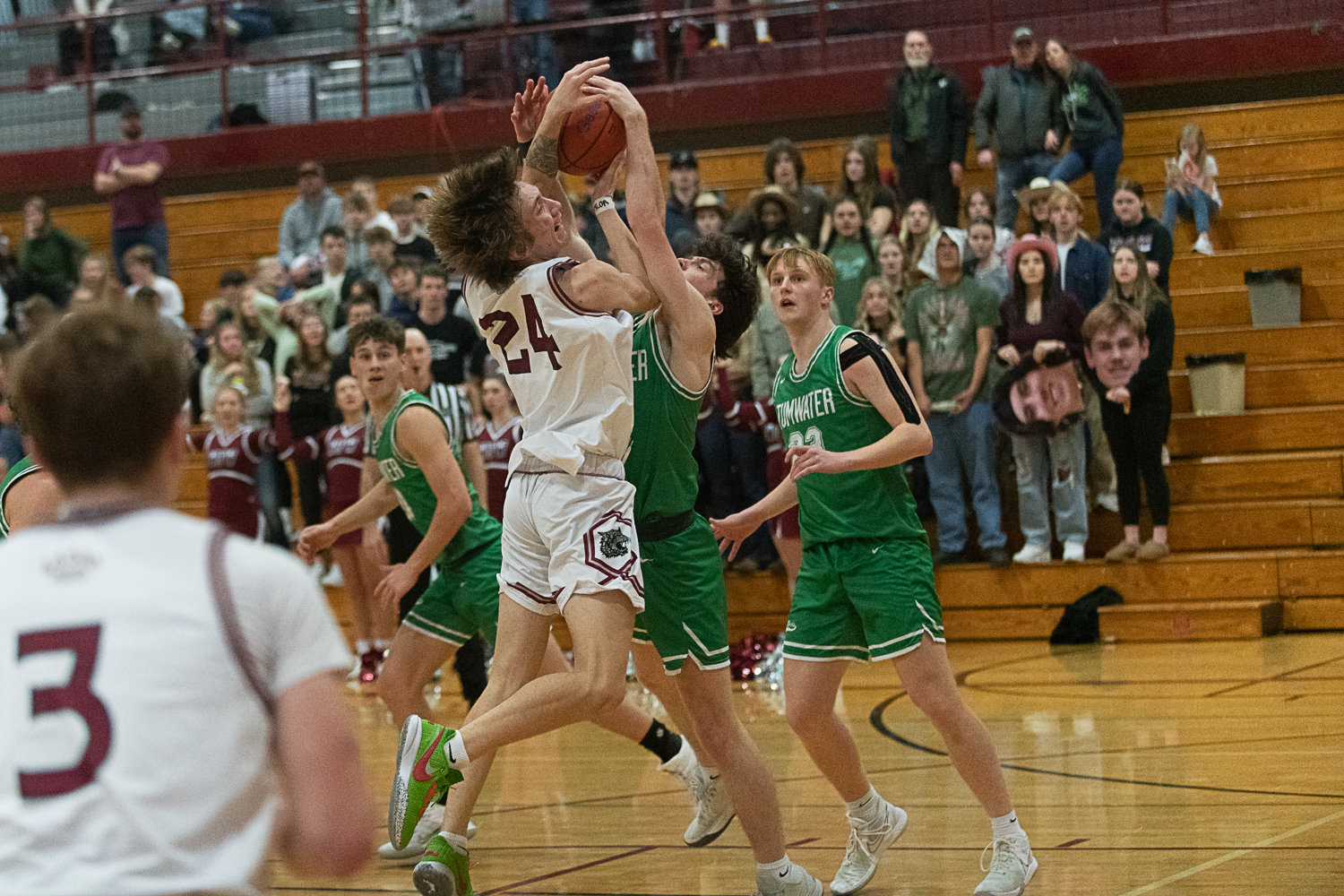 Tyler Klatush draws a lot of contact during the second half of W.F. West's 71-58 loss to Tumwater on Jan. 11.