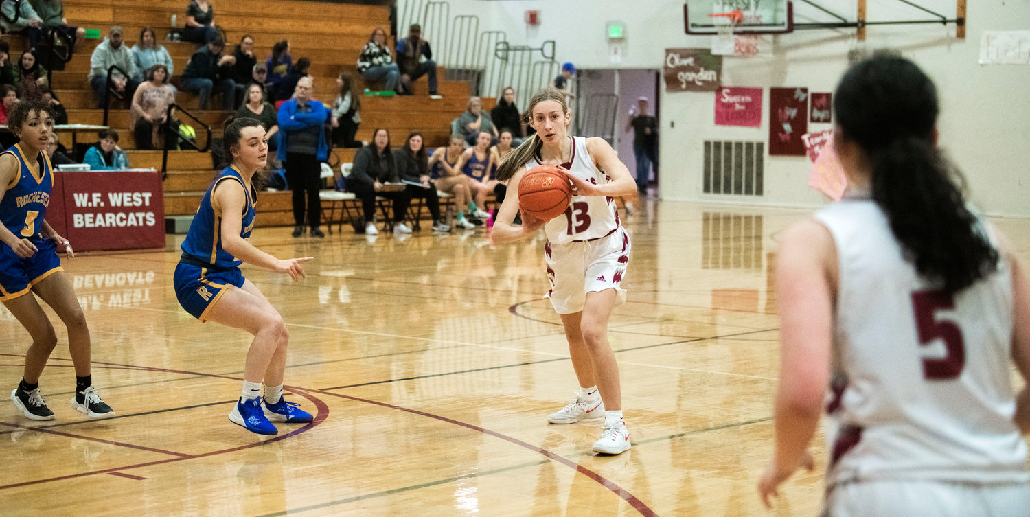 W.F. West’s Presley Mishler (13) looks to pass during a game against Rochester in Chehalis Thursday night.