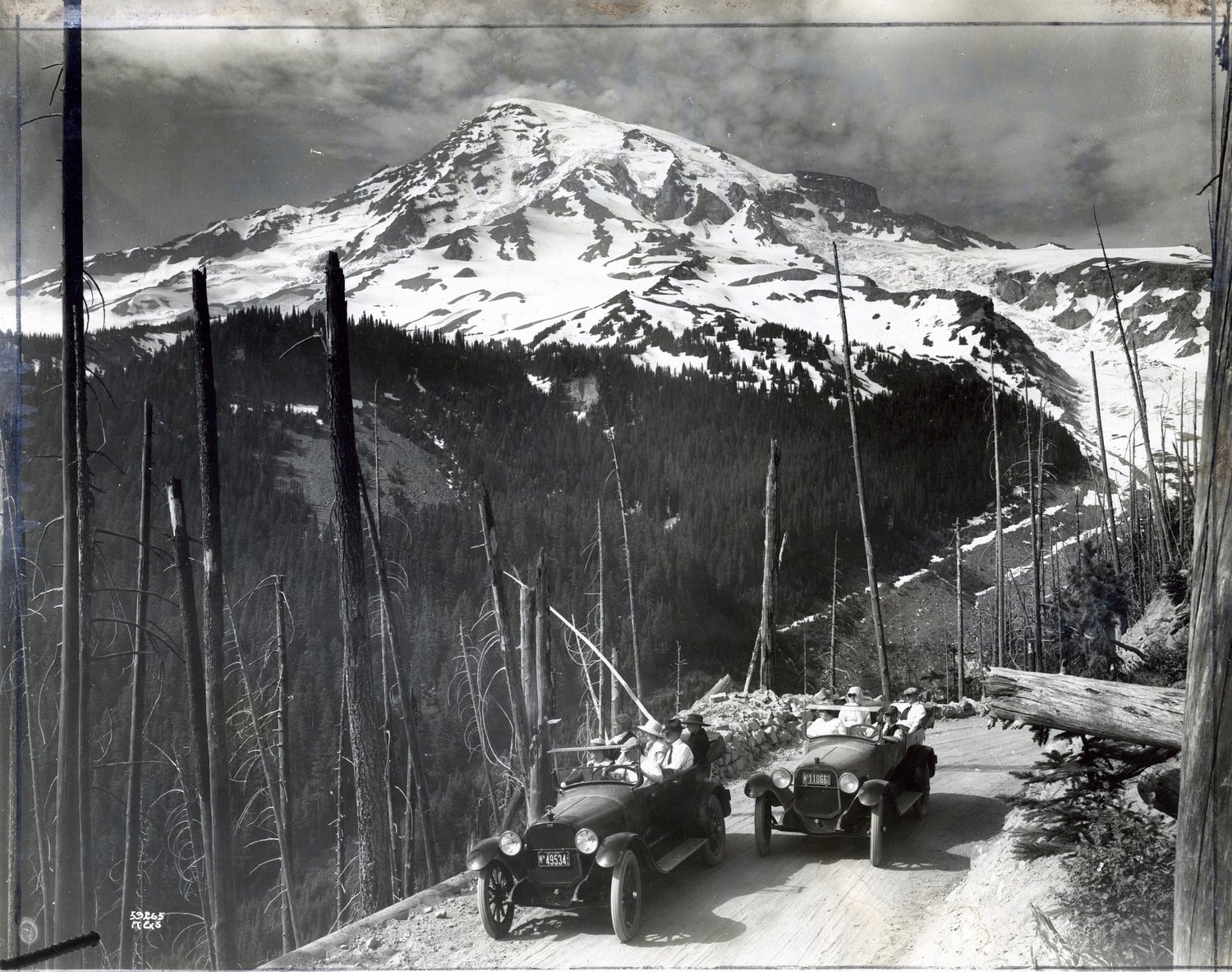 The description of this July 22, 1917, image from the Washington State Archives reads: "Many splendid views of Mount Rainier are obtained by the motorist from the 'upper' road between Nisqually Glacier and Paradise Valley, now open as far as Narada Falls. This photograph shows the Chandler Six cars mounting from 2,700 feet to 4,500 feet in high gear from Nisqually Glacier to the falls."