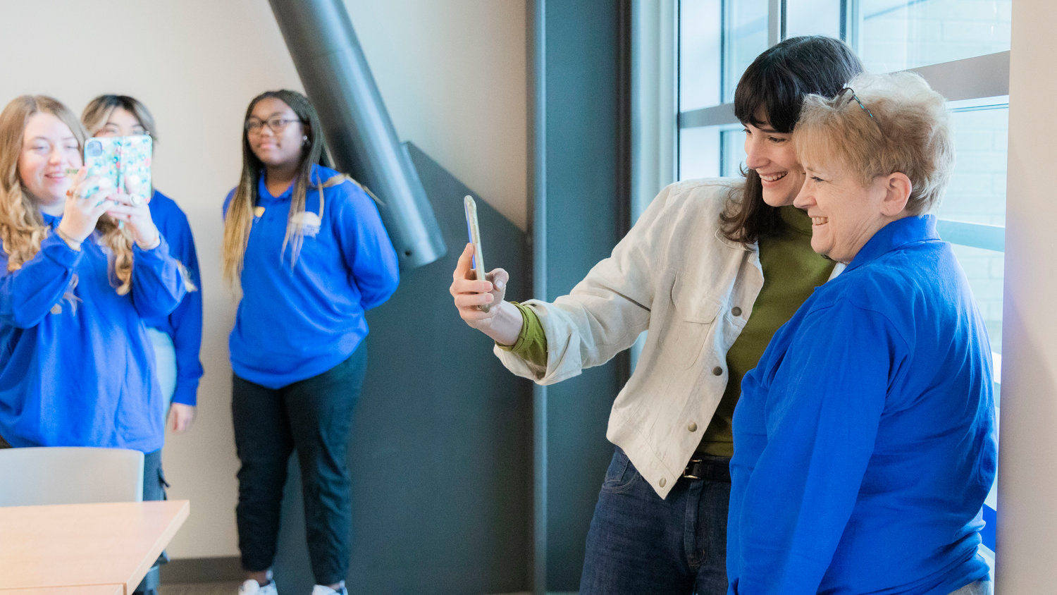 Marie Gluesenkamp Perez smiles for a selfie with Shelly Bannish, director of student life and involvement at Centralia College, before a tour of the campus on Friday.