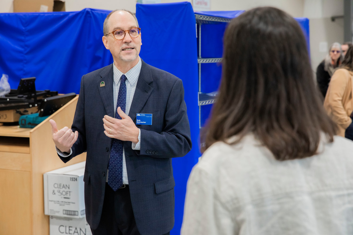 Centralia College President Bob Mohrbacher talks about bachelor programs available for students while taking Marie Gluesenkamp Perez on a tour of the campus on Friday.
