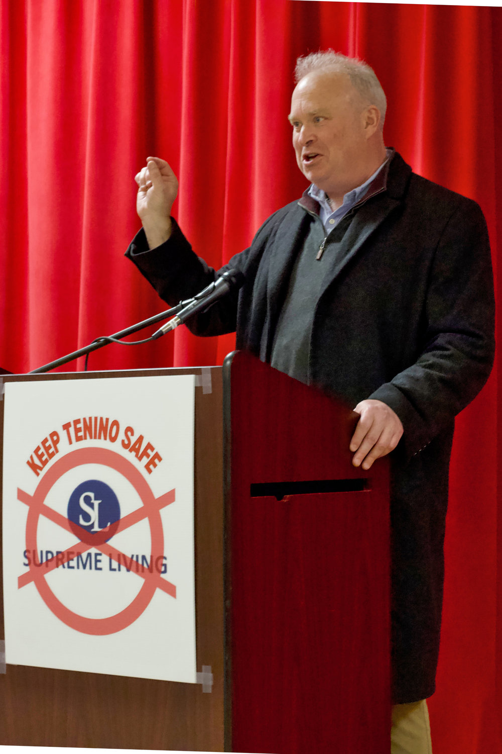 Rep. Jim Walsh speaks during a community meeting at Tenino High School on Sunday where residents gathered to discuss plans to oppose a Supreme Living-run Less Restrictive Alternative facility for sex offenders.