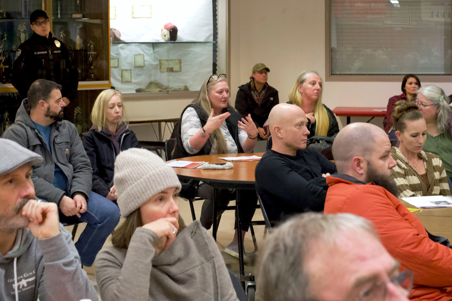 A Tenino-area resident asks a question during a community meeting at Tenino High School on Sunday where residents gathered to discuss plans to oppose a Supreme Living-run Less Restrictive Alternative facility for sex offenders.