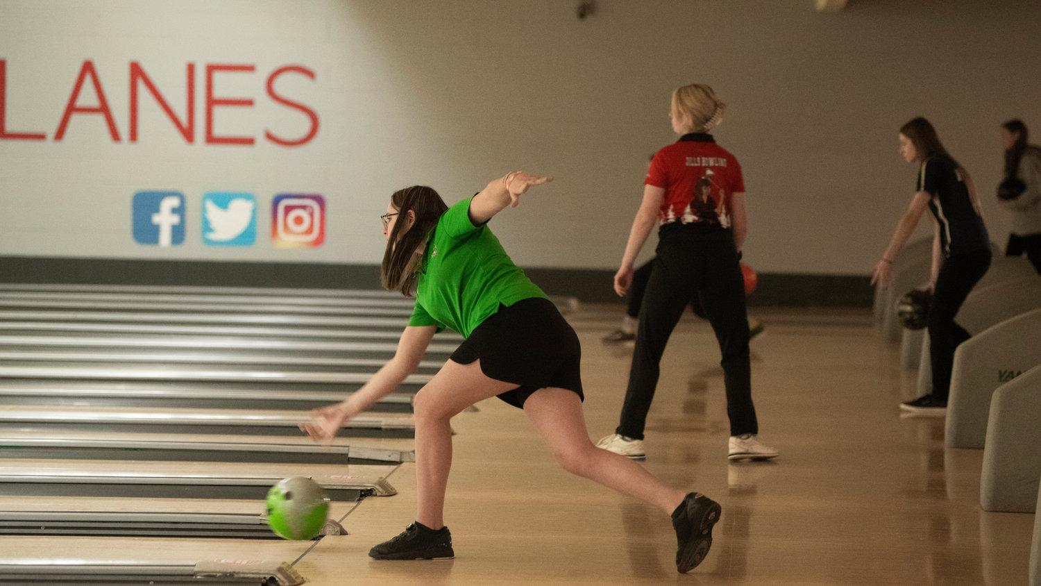Tumwater’s Hailey Hopkins bowls at Westside Lanes in Olympia.