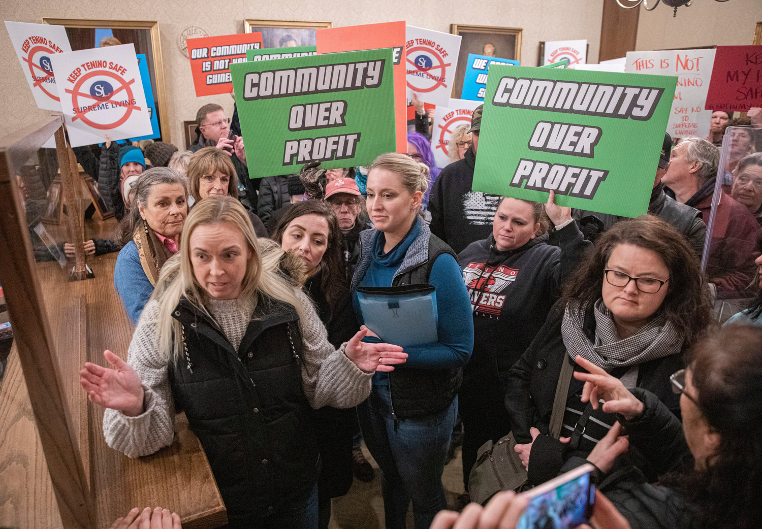 Angry and concerned citizens march into the Governor’s office and present a petition with over 3,000 signatures asking Governor Jay Inslee to take a harder look at how things were handled with Supreme Living.