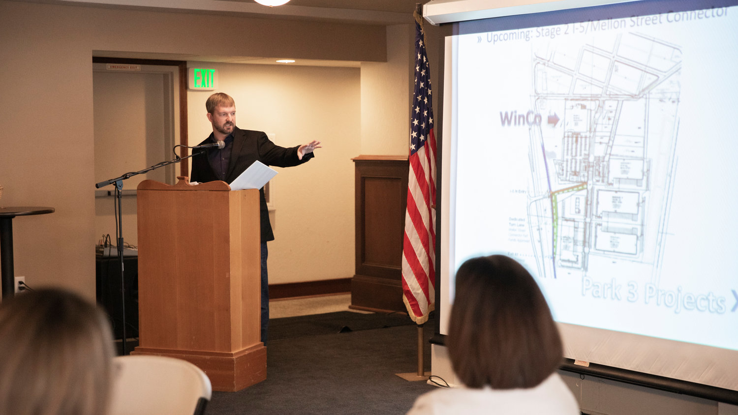 Port of Centralia Commissioner Kyle Markstrom points to a map of the Centralia Station project featuring Winco during a Port of Centralia meeting at O’Blarney’s Wednesday morning.
