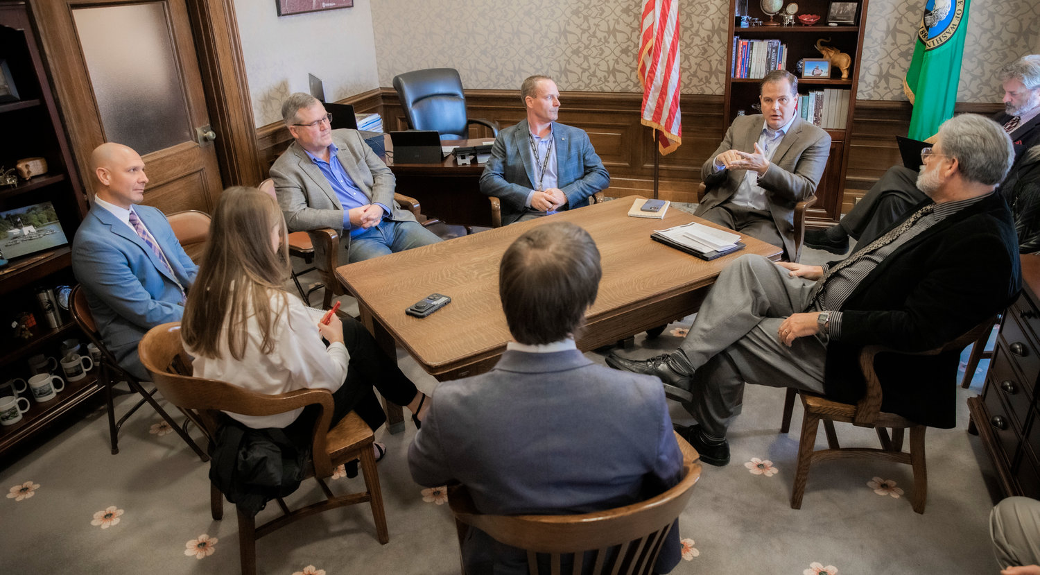 Clockwise from top left, state Rep. Peter Abbarno, House Republican Leader J.T. Wilcox, Chronicle Publisher Chad Taylor, Senate Republican Leader John Braun, state Rep. Ed Orcutt, Chronicle reporter Matthew Zylstra and Chronicle Assistant Editor Isabel Vander Stoep discuss the legislative session in Braun’s office at the Capitol on Jan. 20.