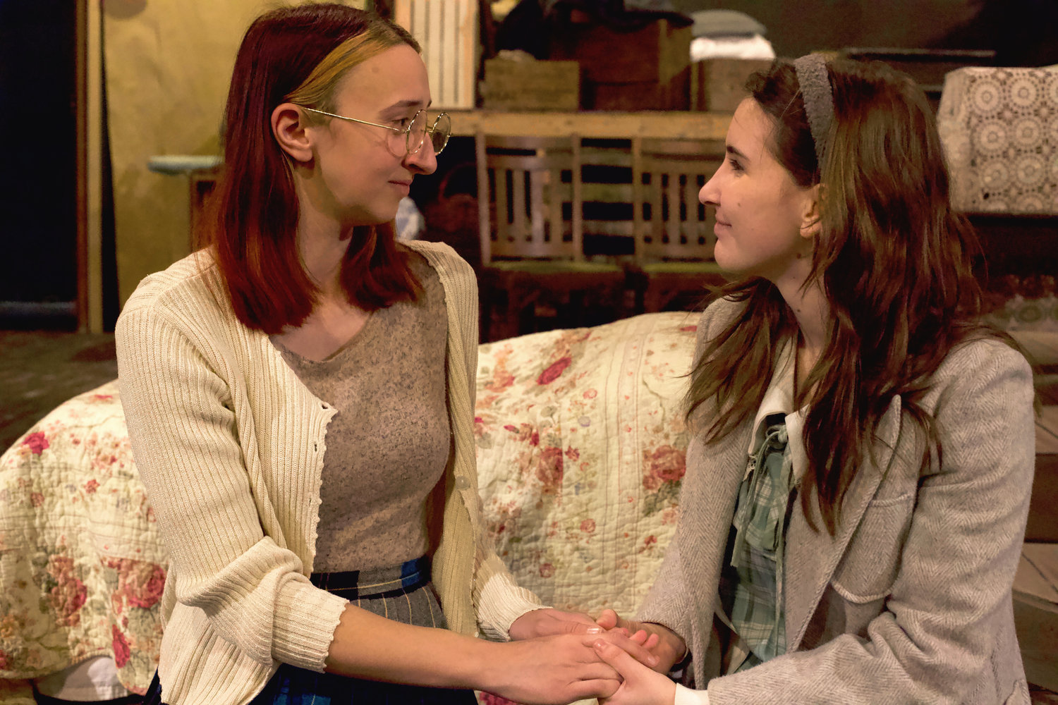 Lizzie Conner as Margot Frank, left, and Ruby Stanton as Anne Frank perform during a rehearsal of “The Diary of Anne Frank” at the Evergreen Playhouse in Centralia last week.