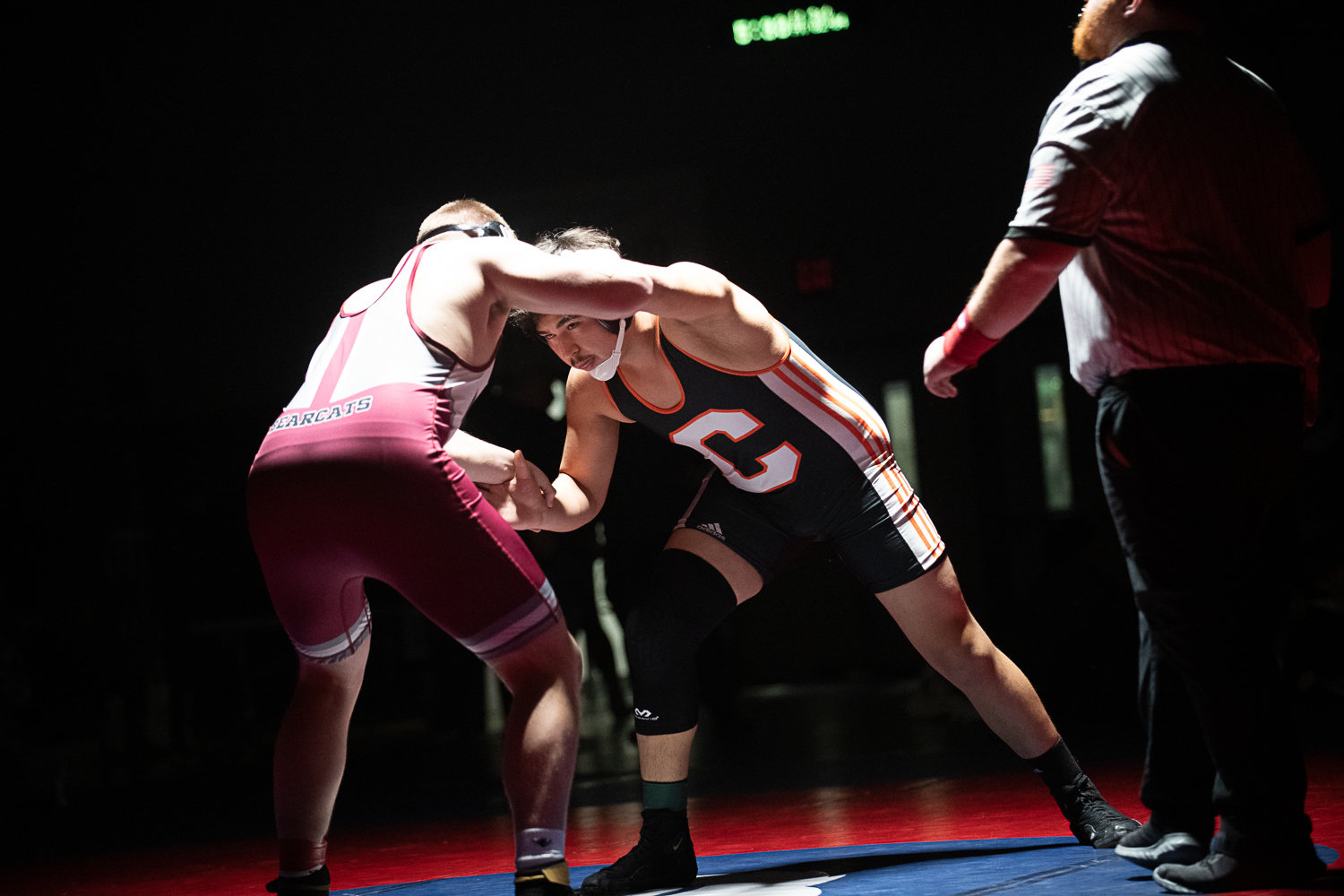 Centralia's Eriberto Mojica grapples with W.F. West's Andrew Penland during the 220-pound finals at the 2A Evergreen Sub-Regional Tournament at Black Hills on Feb. 4.