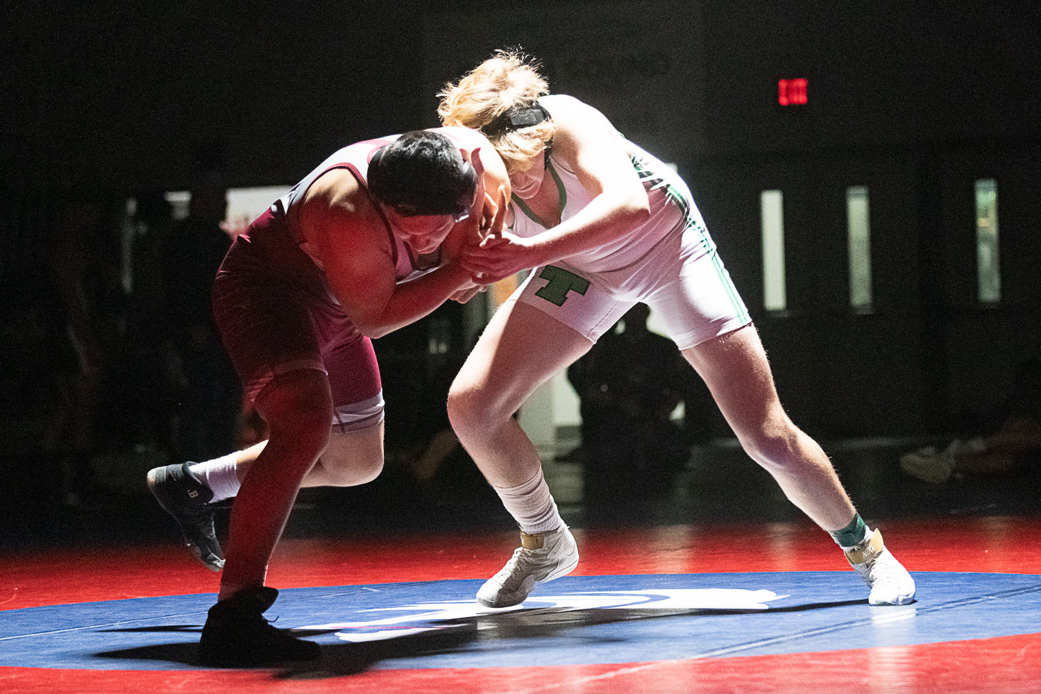 W.F. West's Angelo Peters takes on Tumwater's Nathan Boone during the 195-pound finals at the 2A Evergreen Sub-Regional Tournament at Black Hills on Feb. 4.