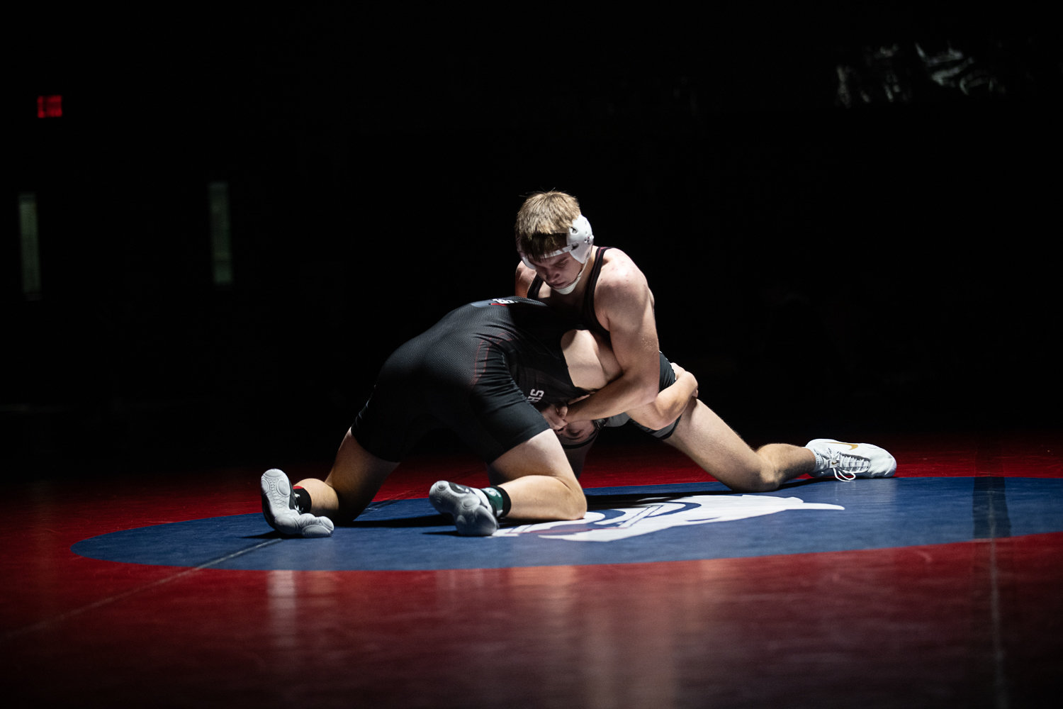 W.F. West's Tucker Land gets over his foe during the 170-pound finals at the 2A Evergreen Sub-Regional Tournament at Black Hills on Feb. 4.