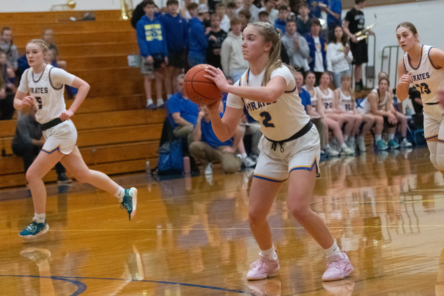 Danika Hallom winds up from beyond the arc in the first half of Adna's district matchup against Raymond at Rochester on Feb. 7.