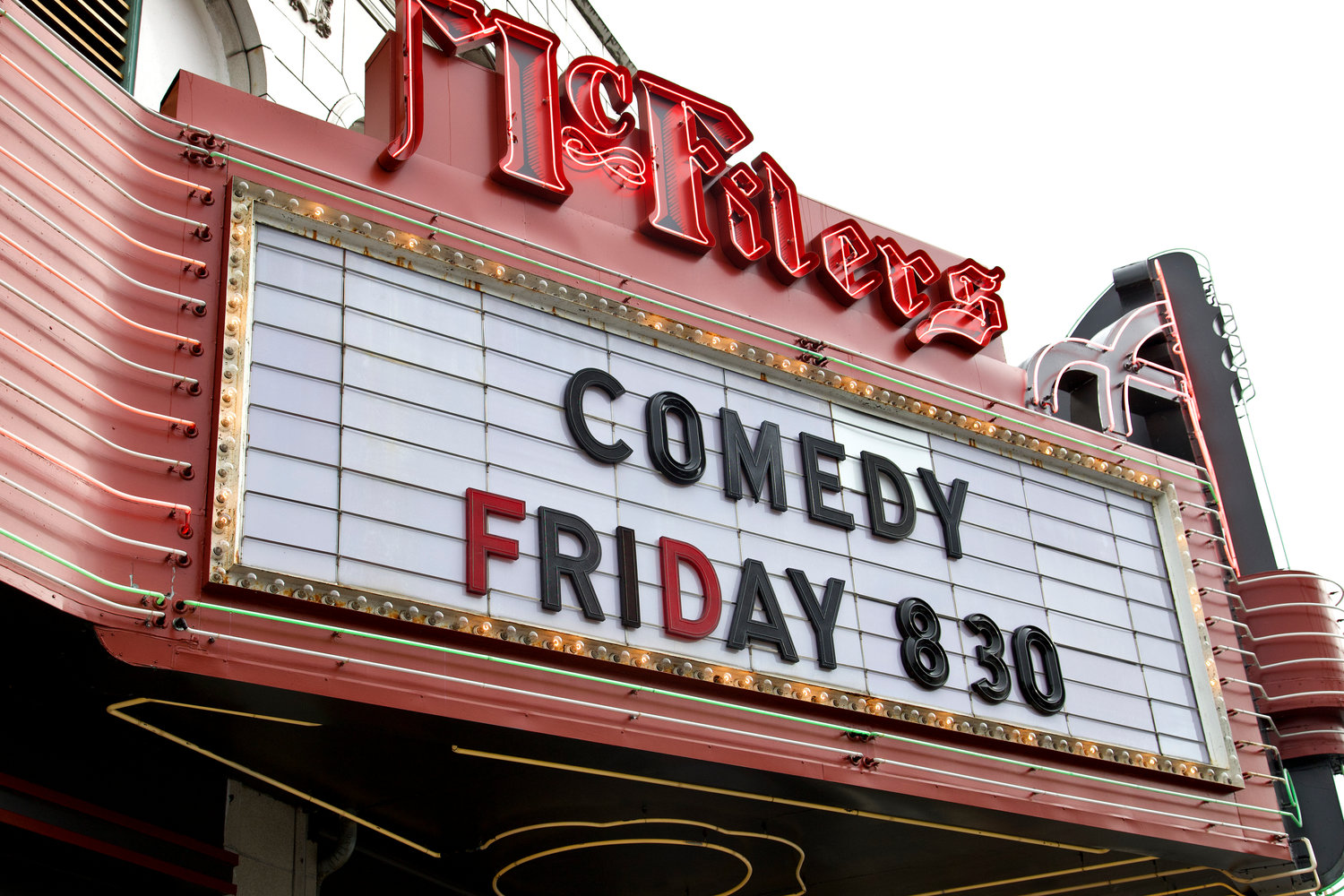 The marquee of McFiler’s Chehalis Theater advertises an upcoming comedy show on Tuesday.