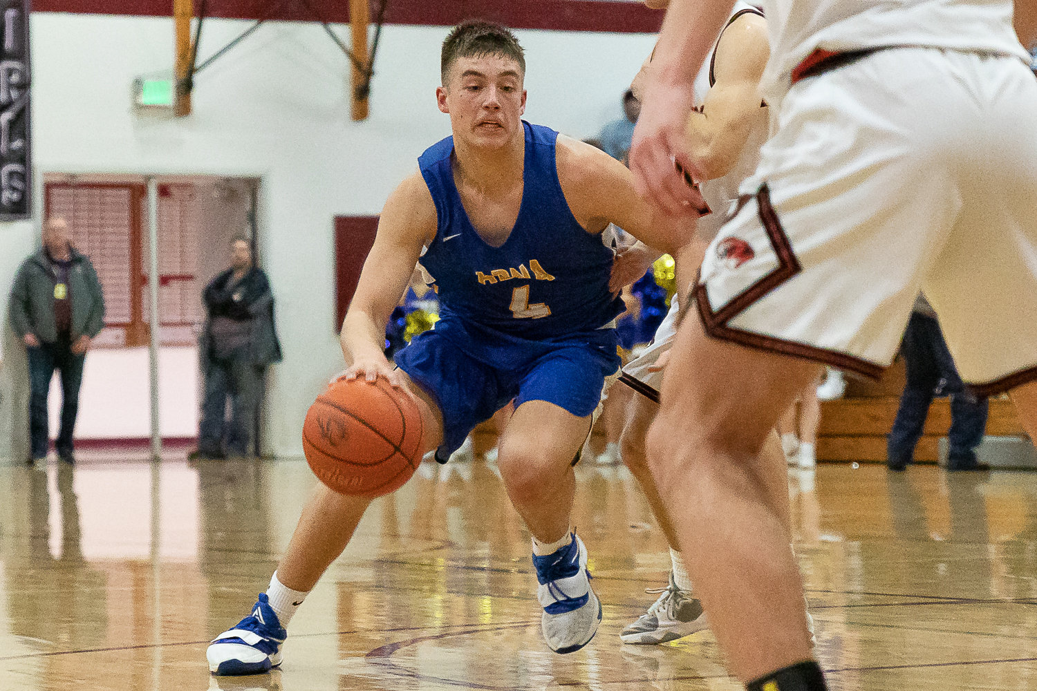 Adna forward Asher Guerrero drives against Napavine in the 2B District 4 quarterfinals at W.F. West Feb. 8.