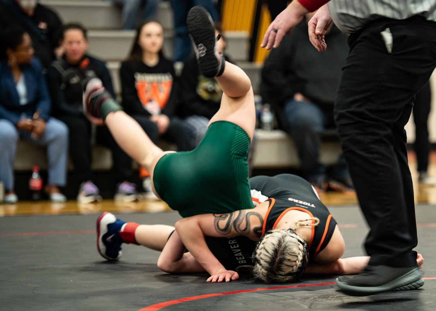 Centralia's Jade Hudson (right) wrestles with a Woodland grappler Saturday afternoon at the 1B/2B/1A/2A Regional in Shelton.