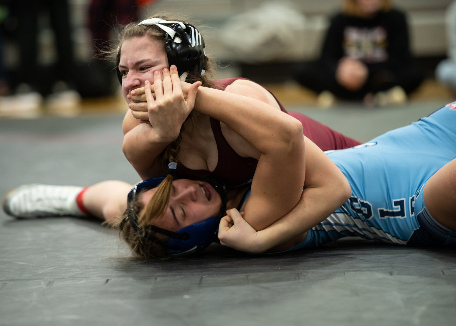 W.F. West wrestler Lia Hornby gets close to pinning Elma's Hailee Stoken Saturday afternoon at the 1B/2B/1A/2A Regional in Shelton.