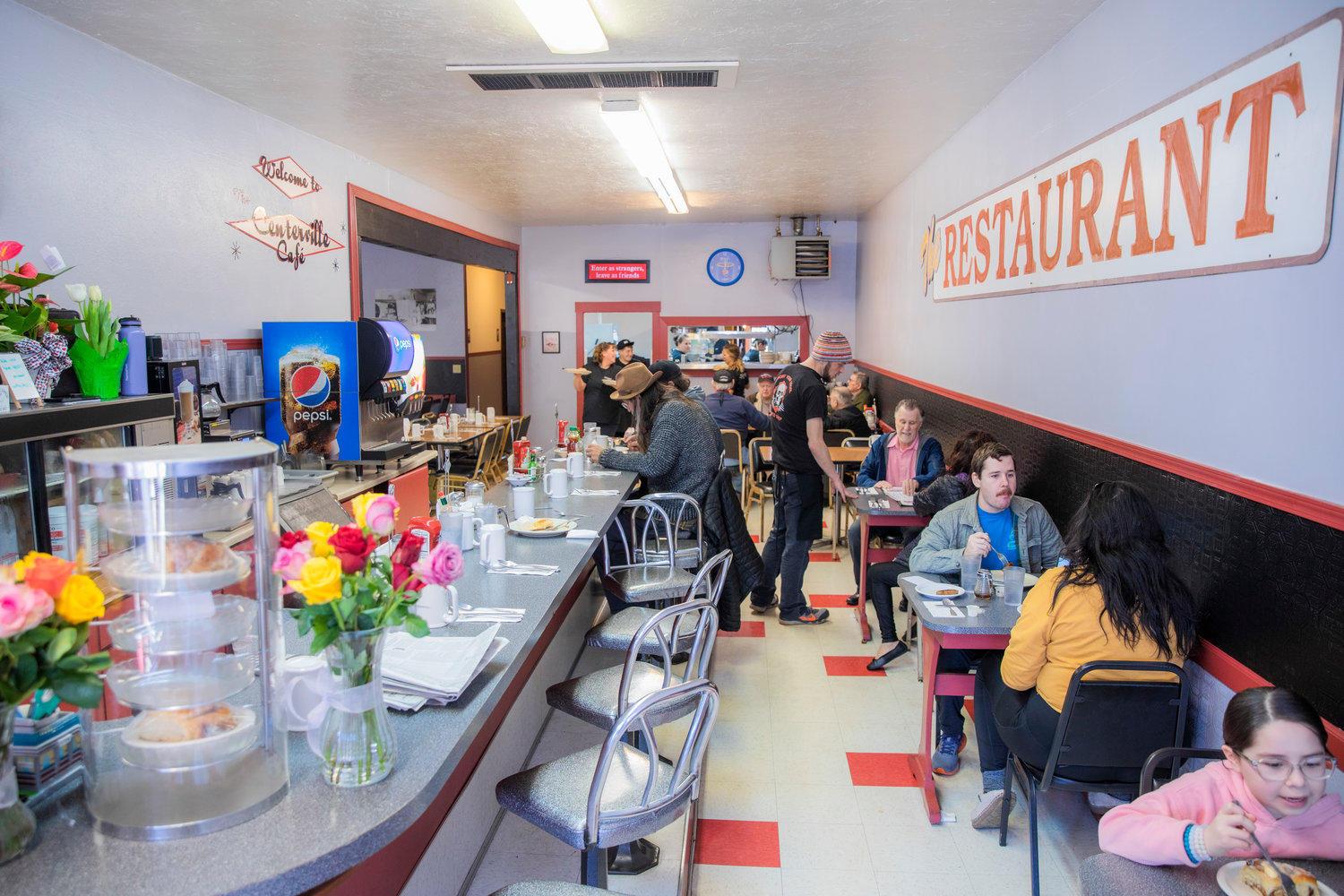 Visitors dine inside The Centerville Cafe in Centralia on Wednesday during a ribbon cutting ceremony hosted by the Centralia-Chehalis Chamber of Commerce.