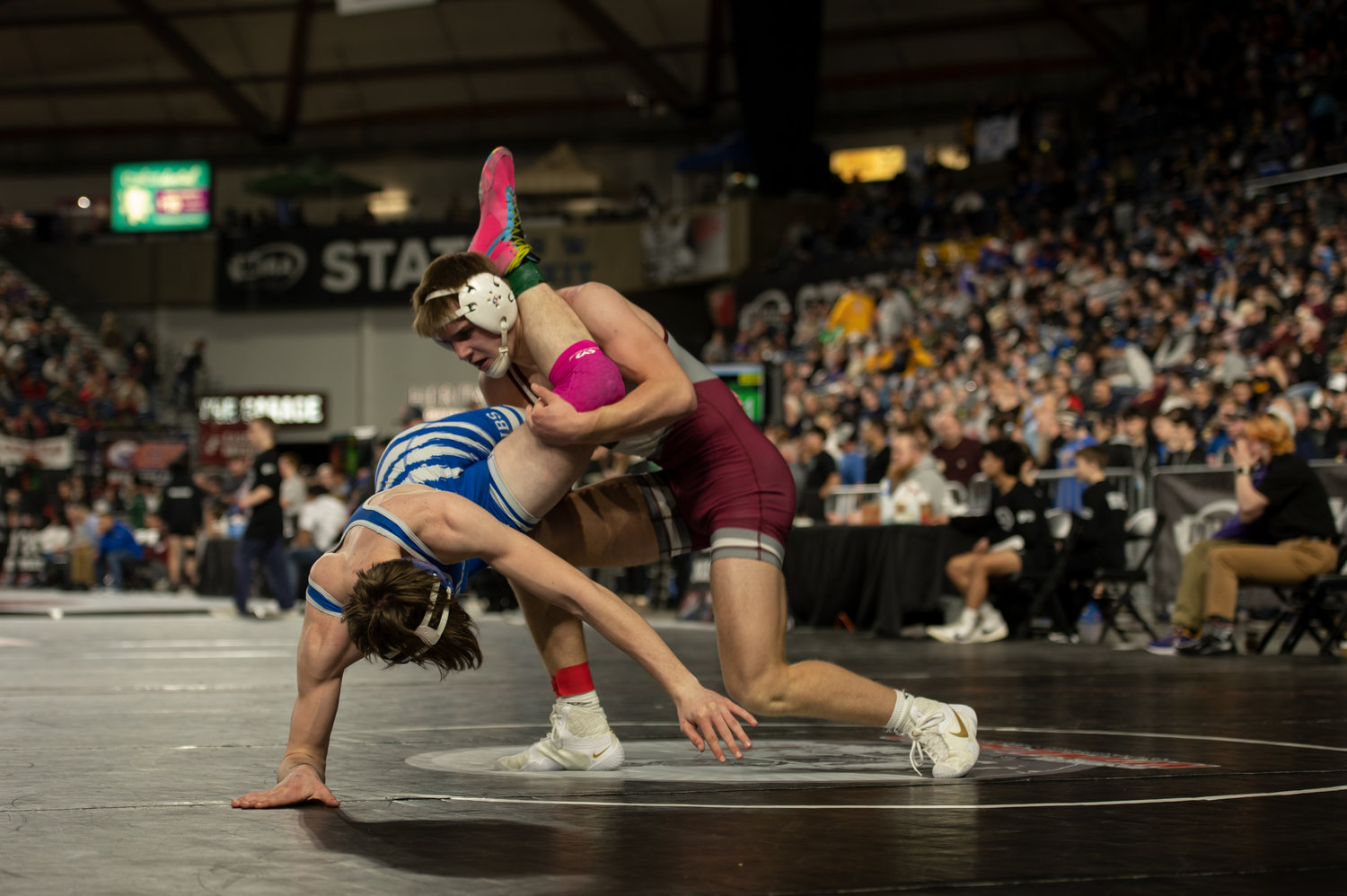 W.F. West's Tucker Land looks to flip Sedro-Woolley's Caleb Hall at the Mat Classic in Tacoma Feb. 17.