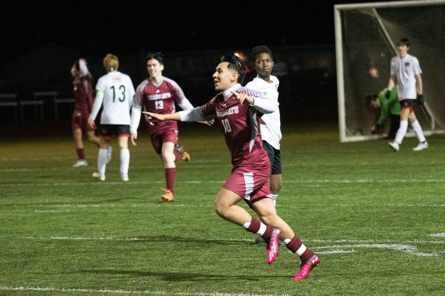Elvis Leal Perez celebrates his goal in the final minute of W.F. West's matchup against Tenino on March 9, and Centralia's jamboree.