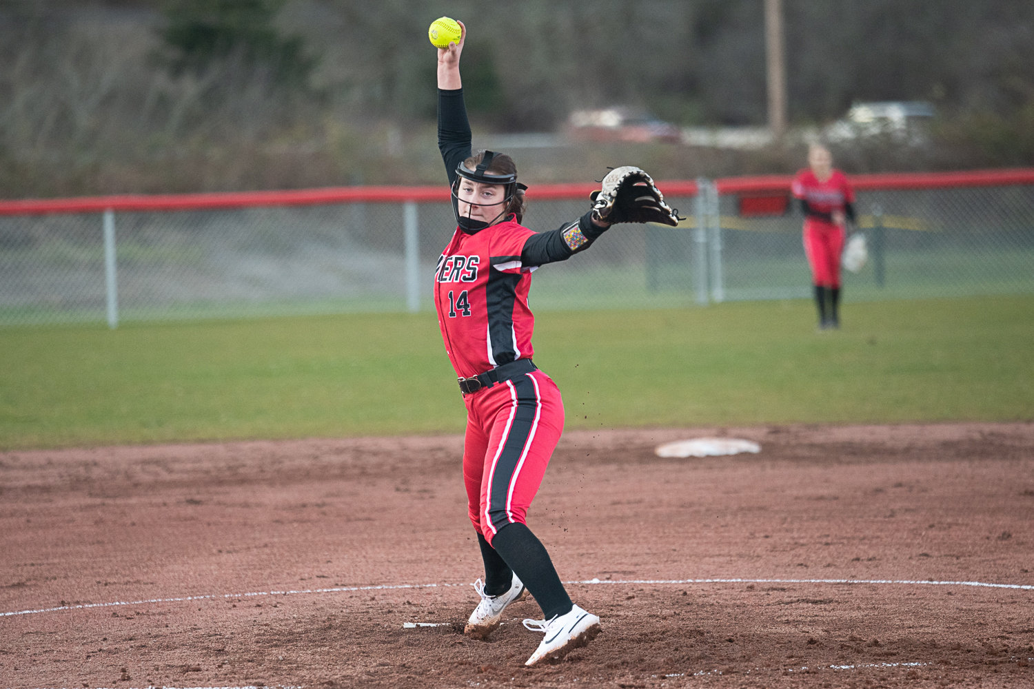Chloe Grayless throws a pitch during Tenino's 27-8 loss to Napavine on March 14.