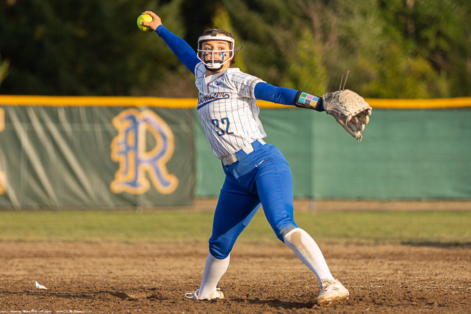 Rochester pitcher Layna Demers winds up to deliver a pitch against Adna March 15.