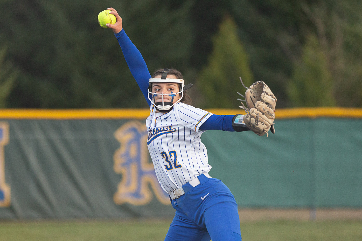 Rochester pitcher Layna Demers winds up to deliver a pitch against Adna March 15.