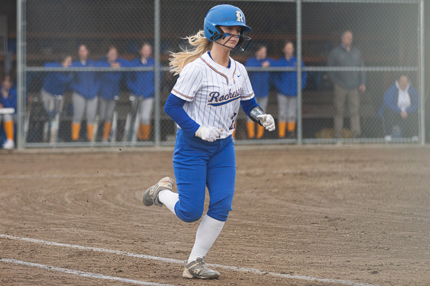 Rochester's Cheyenne Justice trots toward first base against Adna after a walk March 15.