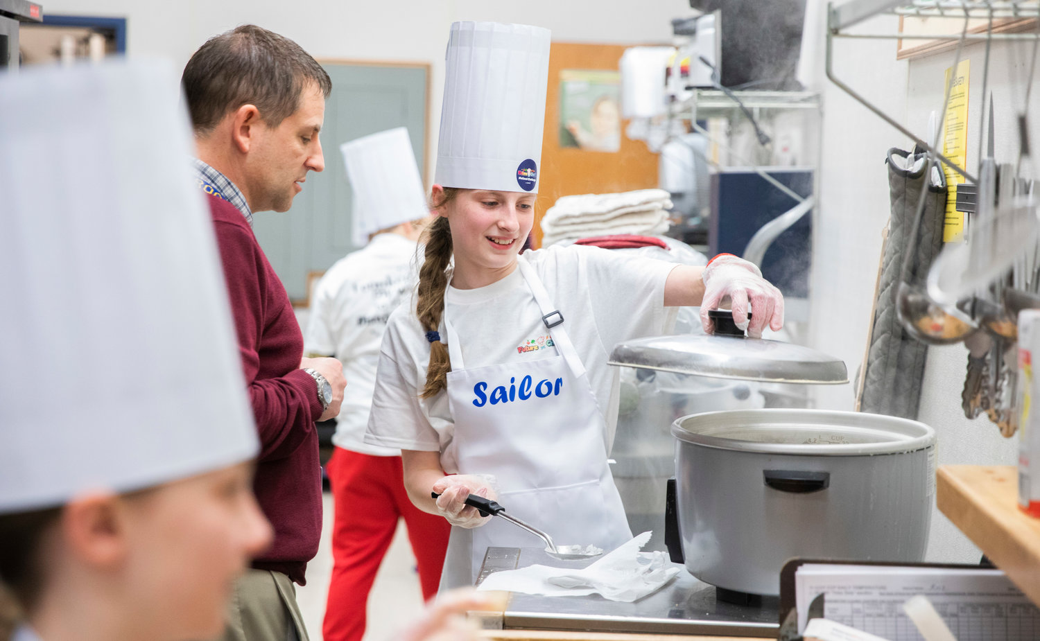 Sailor Fetch, a fifth grader at Grand Mound Elementary, prepares rice for “Fruit Sushi” during a Future Chefs Competition in Rochester on Thursday.