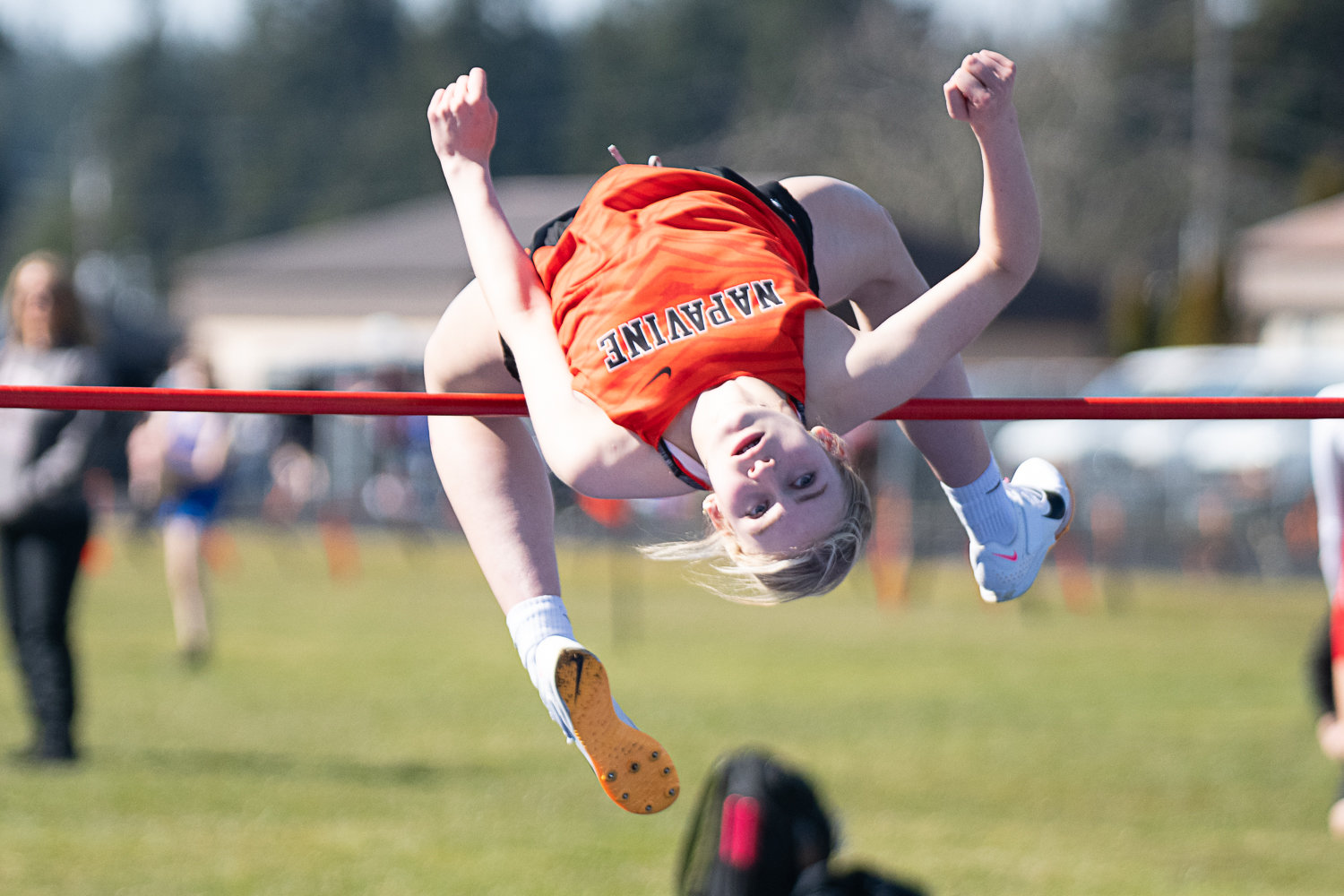 Keira O'Neill clears the bar at the girls high jump at the Rainier Icebreaker on March 18.