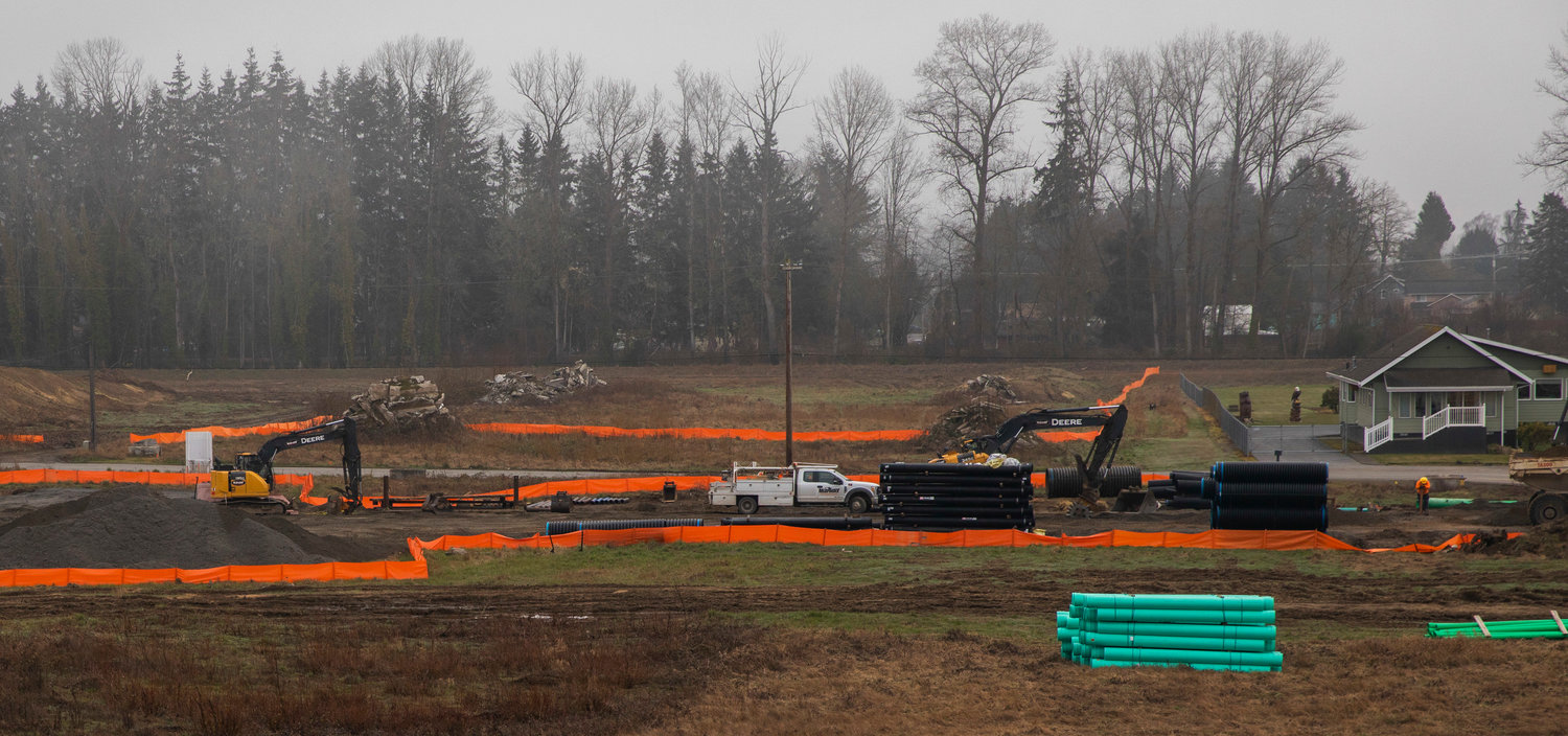 Crews work at the site of the Centralia Station project near Long Road in Centralia in mid-March.