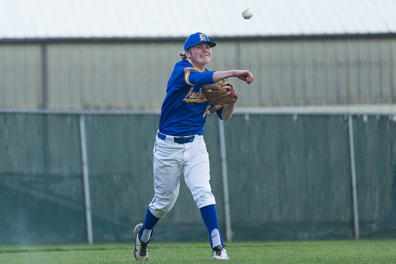 Hyde Parrish throws to first during Rochester's 4-1 loss at W.F. West on March 22.