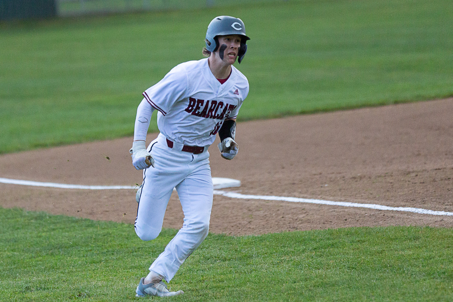 Deacon Meller rounds third to score during the first inning of W.F. West's 4-1 win over Rochester on March 22.