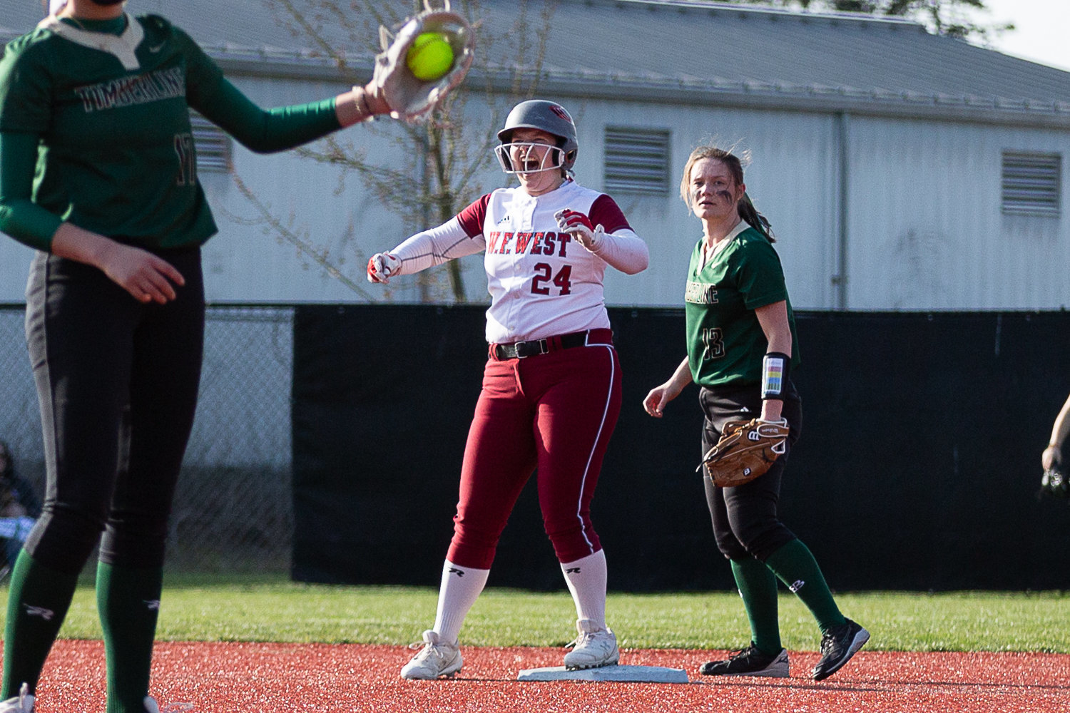 W.F. West first baseman Savannah Hawkins celebrates after a double against Timberline March 16 at Rec Park.