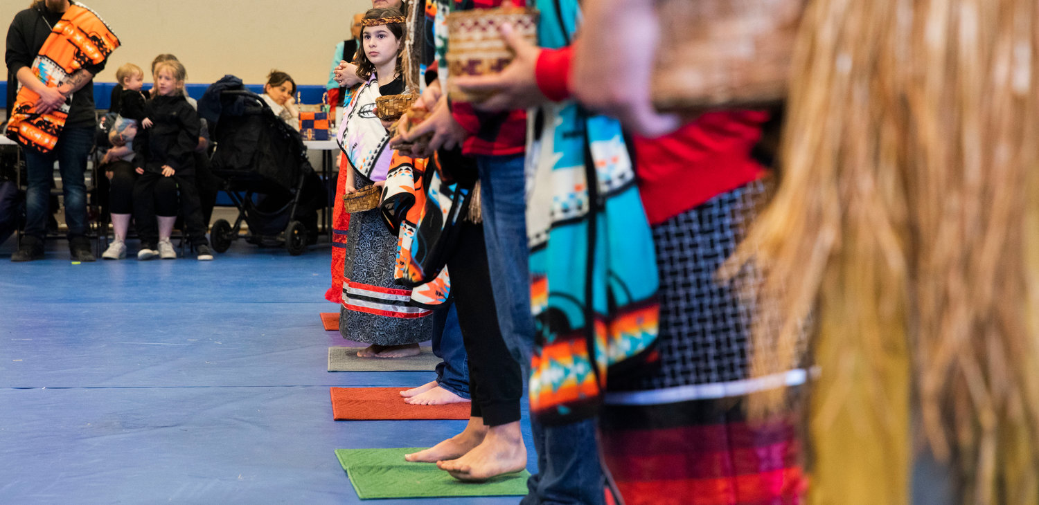 Gatherer Clara Kesler, 7, was the youngest welcomed into the Hazel Pete family at the Chehalis Tribe Community Center in Oakville on Saturday.