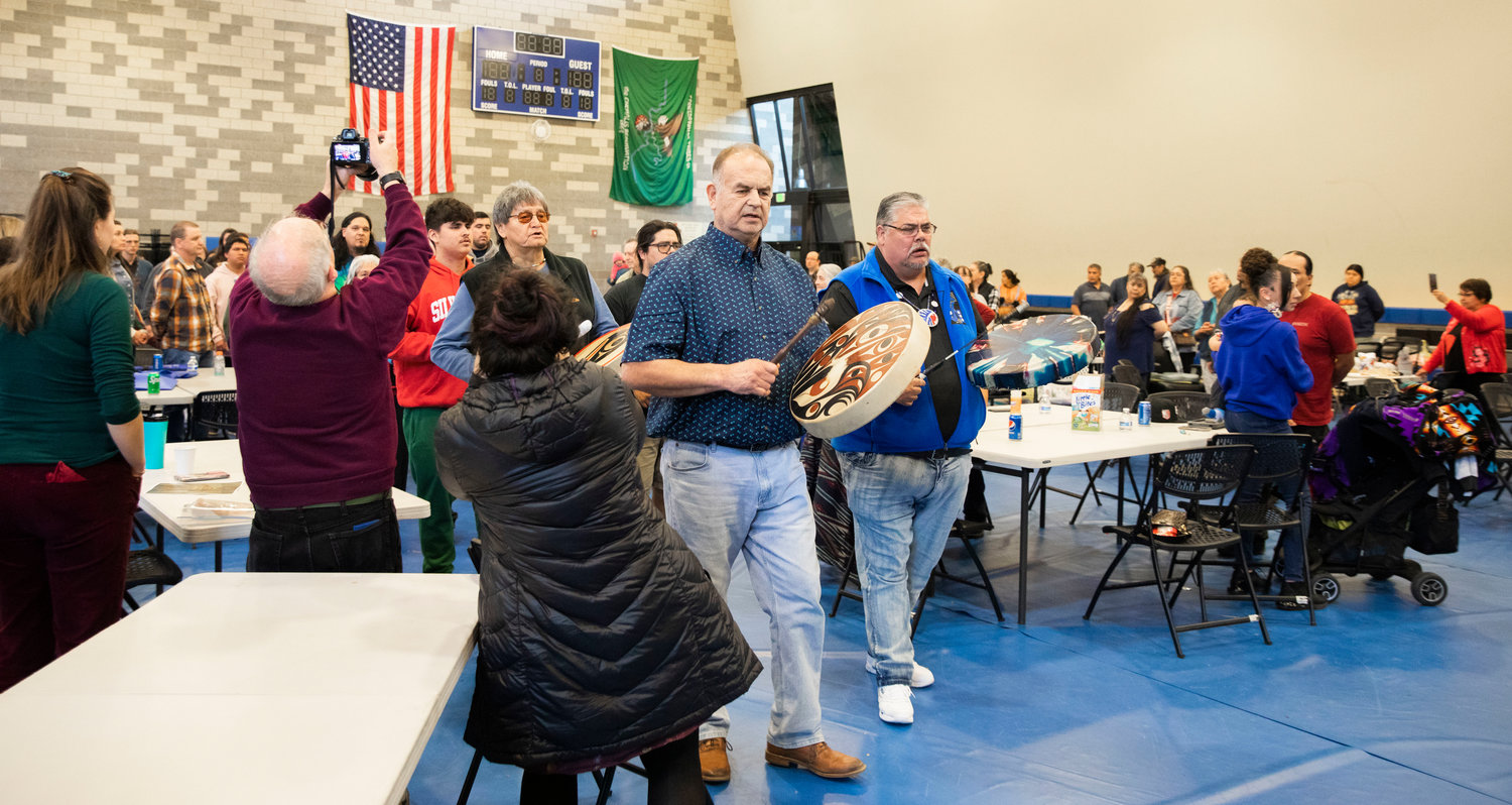 Master of Ceremonies Delbert Miller leads a ceremony with drums while honoring the Hazel Pete legacy at the Chehalis Tribe Community Center in Oakville on Saturday.