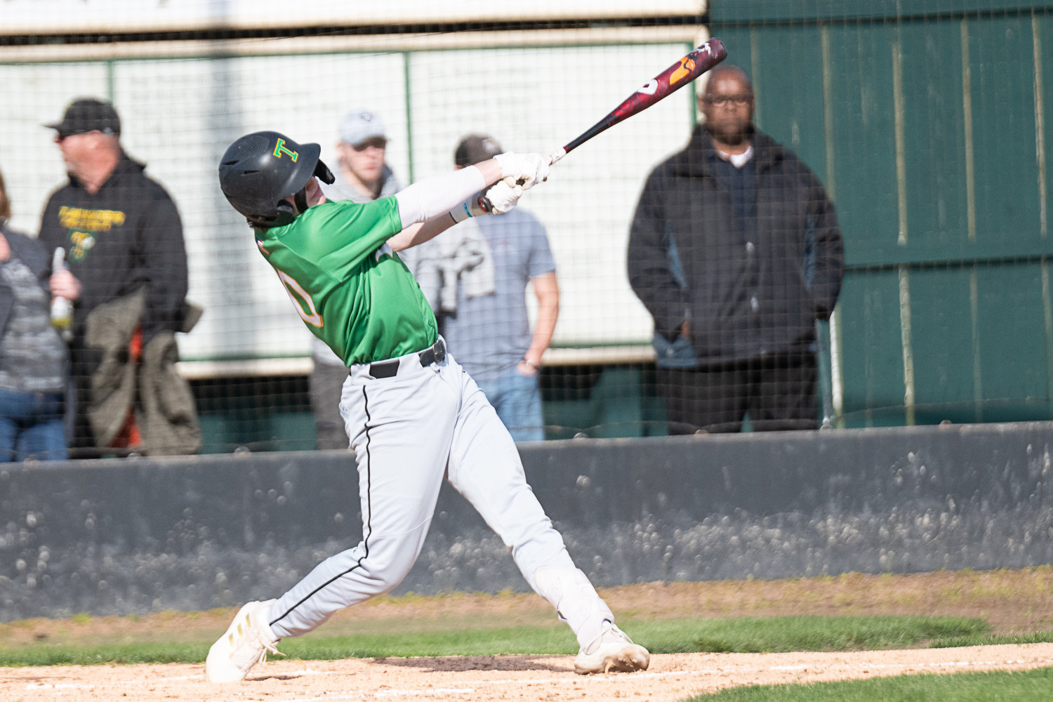 Derek Thompson brings two runs home on a double in the first inning of Tumwater's 10-0 win over Centralia on March 29.