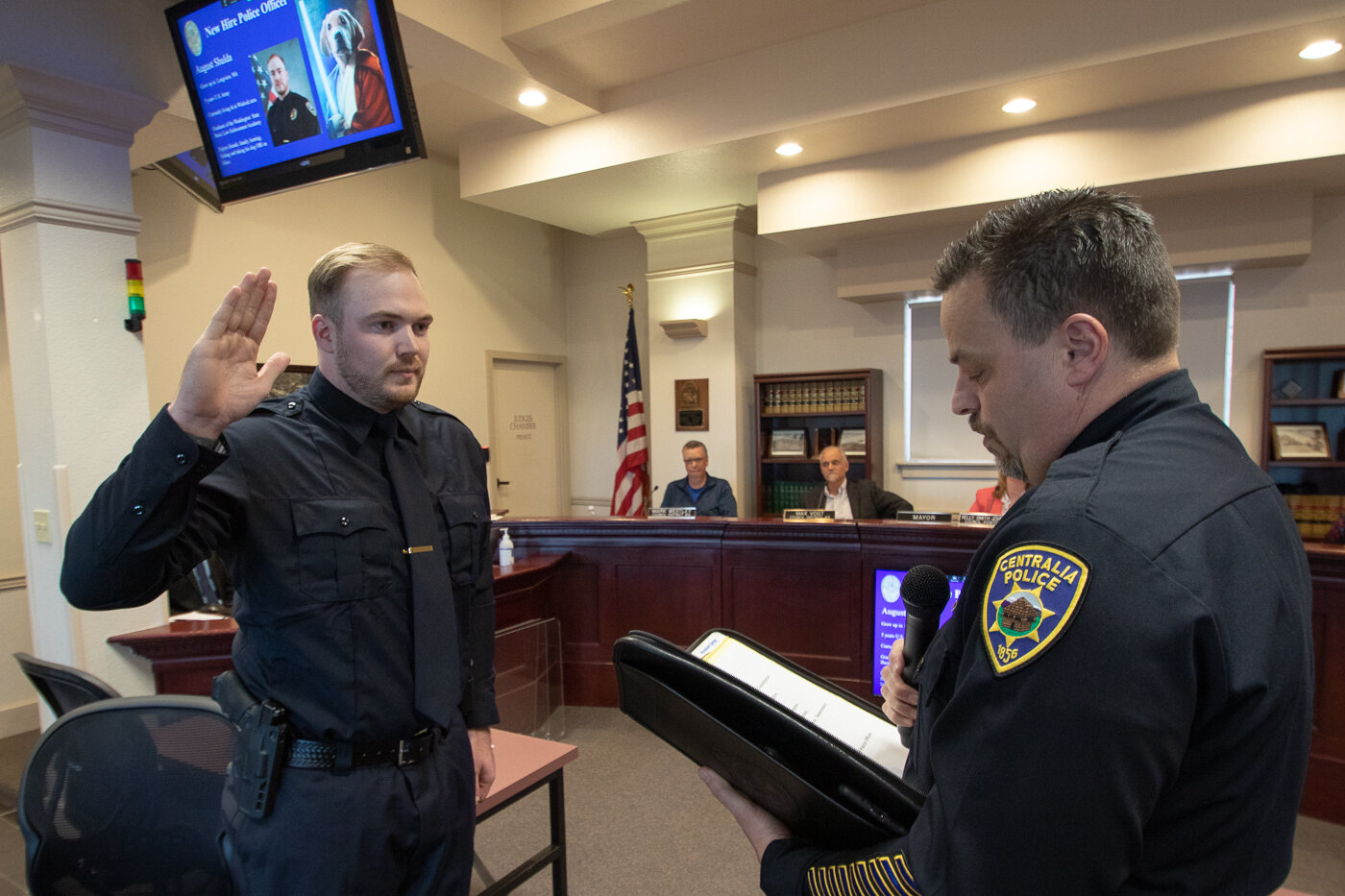 New Centralia Police Officer August Shulda is sworn in by Police Chief Stacy Denham Tuesday night at Centralia City Hall.