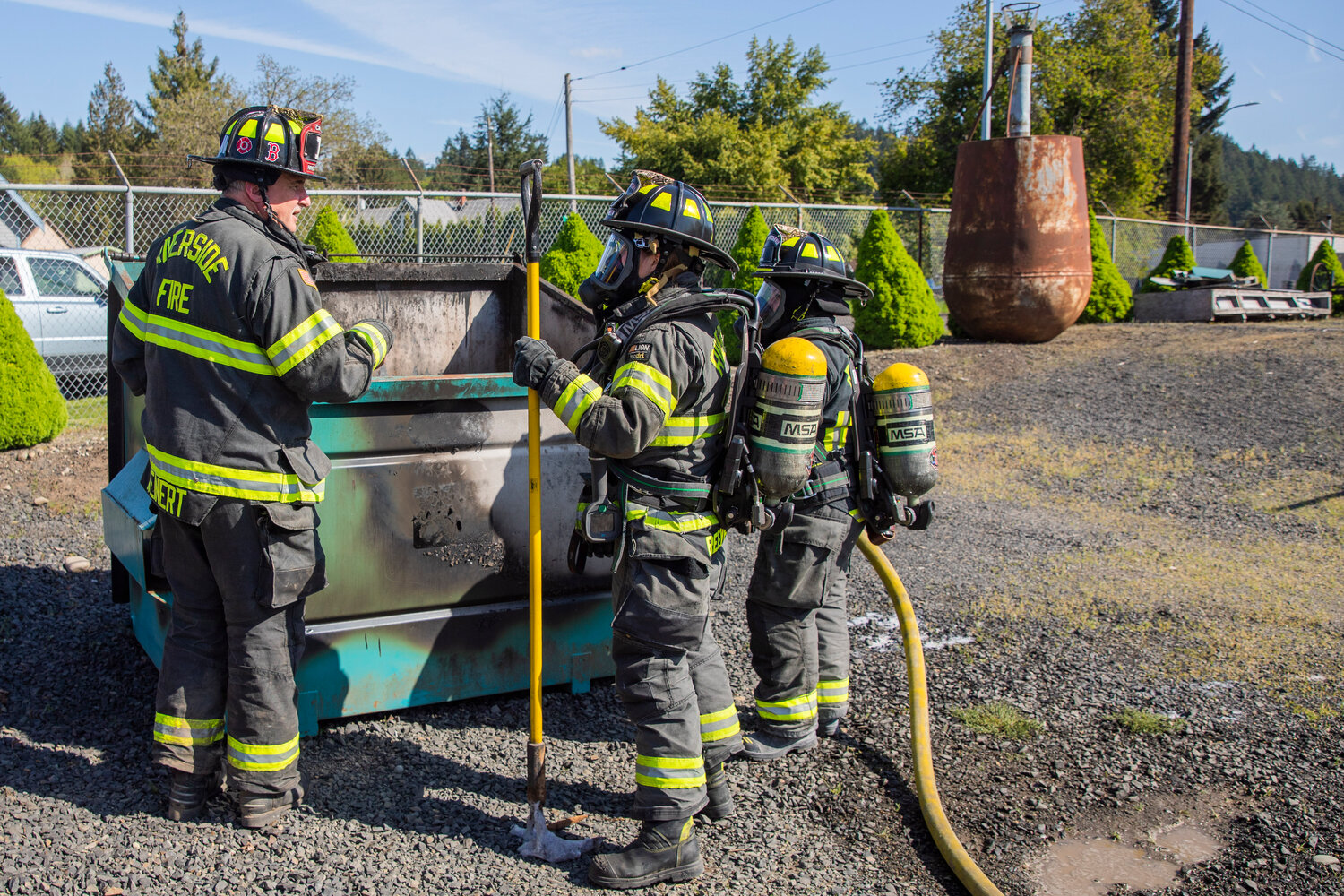 Riverside Fire Authority responds to a dumpster fire along North Gold Street in Centralia on Thursday, May 11.
