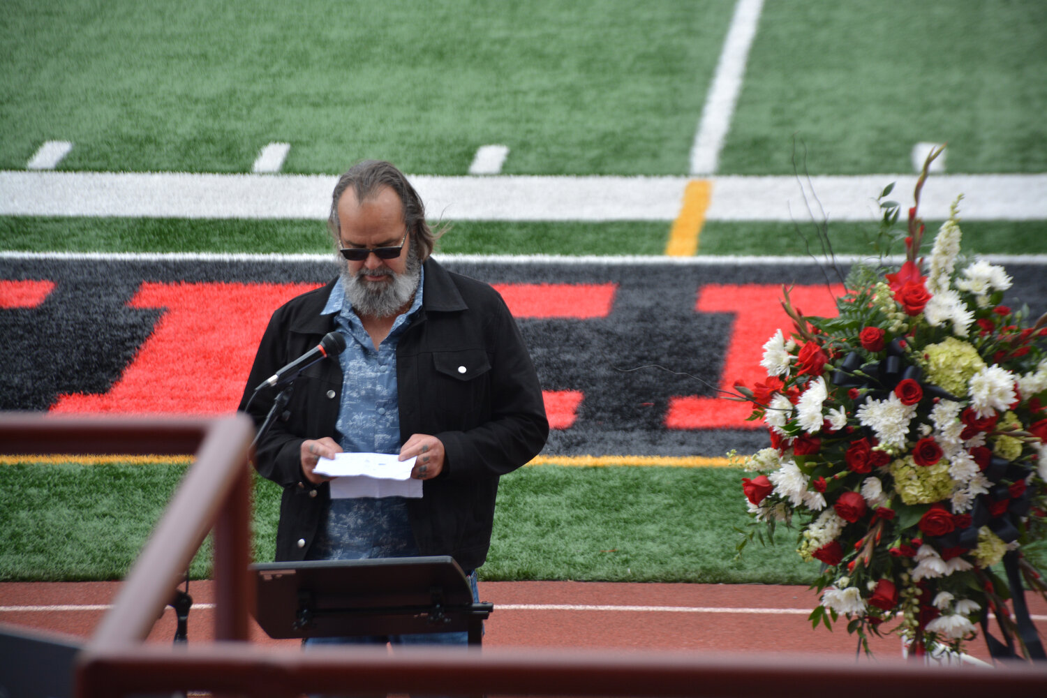 Dwayne McCarver shares his memories of Shawn Jemtegaard at the memorial on May 21.