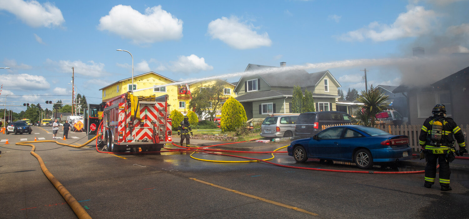 Centralia police block a portion of Centralia College Blvd. while firefighters respond to a scene on Wednesday, May 24.