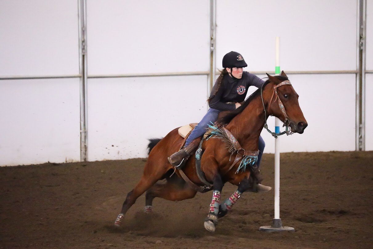 Cyndle Haller (on bay #1220) placed 10th place in the Team Biwrangle event at State last weekend.