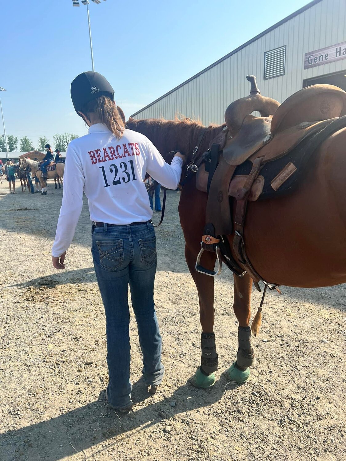Violet Ratkie walks her horse Willow to the arena for Team Canadian Flags. She and her team placed 10th in the state out of 28.