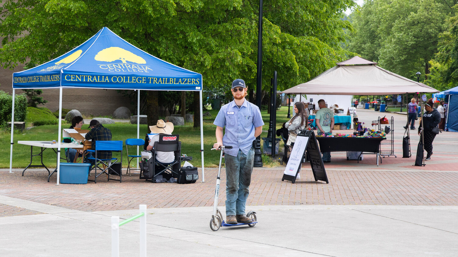 Oliver Macey rides a scooter through Spring Fest at Centralia College on Tuesday, May 23. The annual event, which is open to Centralia College students at no cost, continues from 10 a.m. to 2 p.m. Thursday on the plaza and esplanade.